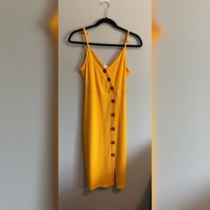 Body con yellow button dress